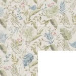 Floral decorated ceramic tile laid out to show the full patterened effect